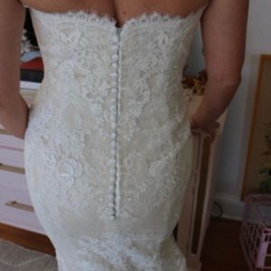 La Sposa pure lace wedding dress .